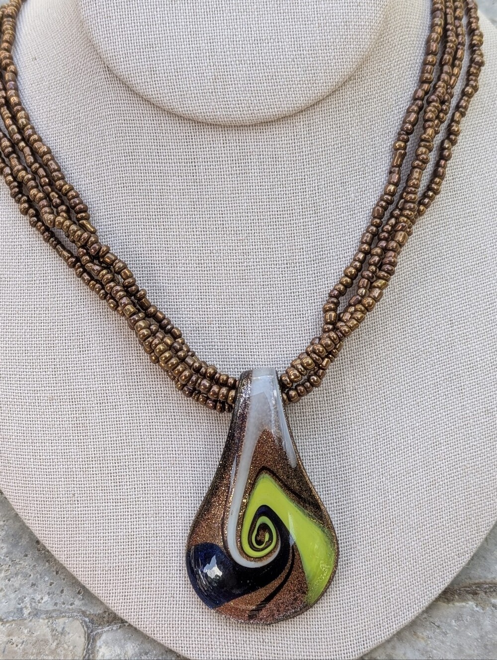 Artisan Multi-Strand Beaded Necklace with Handcrafted Glass Pendant